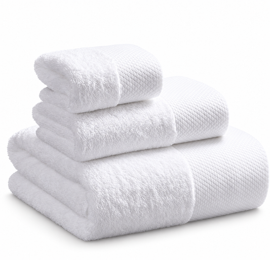 Neat Valley stack of folded white towels on a white background