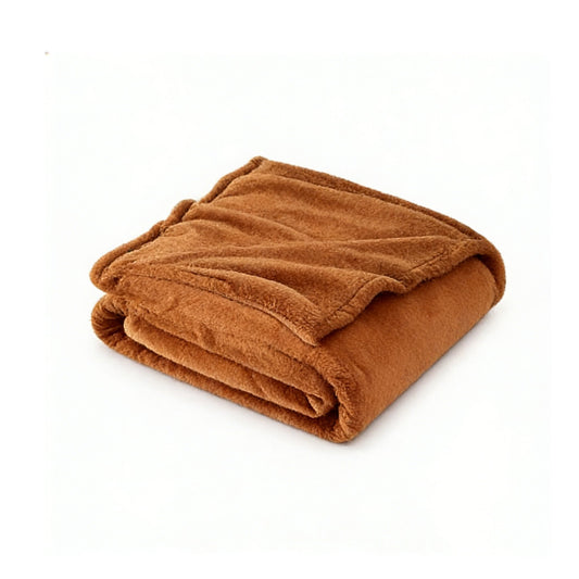 Neat Valley folded rust-colored blanket with a turned-back corner