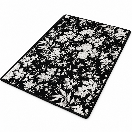 Neat Valley black rectangular mat with a white floral pattern
